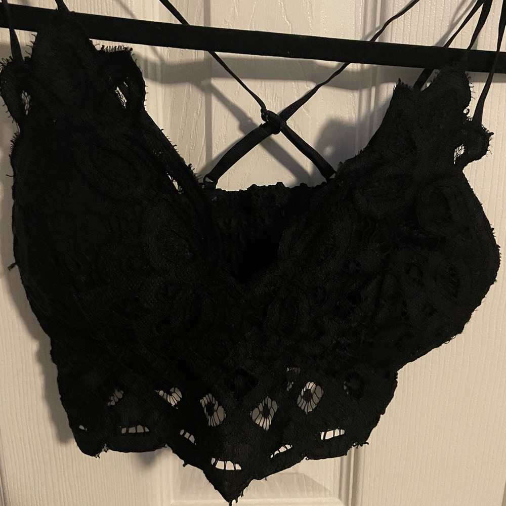 Lace bralette top with criss cross back.